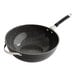 A black and grey speckled Nordic Ware stir fry pan.
