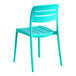 A blue resin side chair with a slatted back and seat.