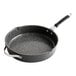A black and silver Nordic Ware saute pan with a handle.