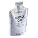 A white plastic bag of Numilk Barista Oat Milk Concentrate with black text.