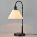 A 20-inch matte black table lamp with a white fabric shade and a rotary switch on the socket.