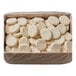 A box of Pillsbury Garlic Cheddar Easy Split preformed biscuit dough, with round white objects inside.