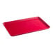 A large rectangular red fiberglass display tray.