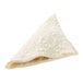 A sugared apple turnover with a white surface.