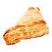 A close up of a sugared apple turnover pastry.