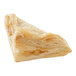 A close up of a turnover pastry on a white background.