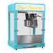 A blue and silver Paragon Zenith countertop popcorn machine.