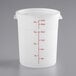 A large translucent round polypropylene food storage container with a lid and red measurement markings up to 22 quarts.