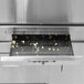 A yellow Paragon Zenith countertop popcorn machine with fresh popcorn.
