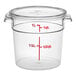 A clear round polycarbonate food storage container with a lid and red measurement markings.