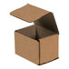 A brown Lavex corrugated mailer box with an open lid.