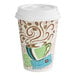 A stack of Dixie paper hot cups with a coffee cup and white lid on top.