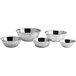 A set of five stainless steel mixing bowls in varying sizes.