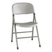 A gray contoured injection-molded folding chair with a charcoal frame and gray legs.