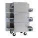 A triple stacked stainless steel electric conveyor oven with three 16 3/4-inch wide belts and digital controls, mounted on casters.