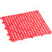 A red plastic interlocking bar mat with a grid pattern.