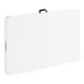 A large rectangular white plastic bi-folding table with a black carrying handle and gray legs.