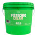 A green Vor pistachio cream pail with white text on a green and white label.