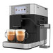 A Kitchen Aid black espresso machine with two cups of coffee on the side.