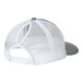 A white and grey Port Authority 6-panel ponytail trucker cap with a mesh back.