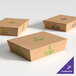 A group of Southern Champion cardboard take-out boxes with blue and red logos.