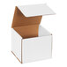 A white corrugated mailer with a tuck top lid.