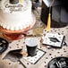 a graduation party with a cake and confetti