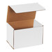A white corrugated mailer box with a lid open.
