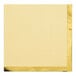 A square white paper beverage napkin with a gold border.