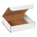 A white open Lavex corrugated mailer box with a lid.