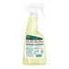 A close-up of a Murphy Oil Soap spray bottle with a white label and sprayer.