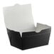 A black folded paper take-out box with a white lid.