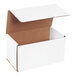 A white corrugated mailer box with a brown tuck top lid.