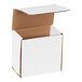A white corrugated mailer with a lid open.