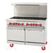 An American Range stainless steel gas range with griddle and 4 burners and 2 ovens.