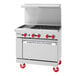 An American Range stainless steel 4-burner range with 12" griddle and oven.