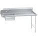 A stainless steel Advance Tabco soil dishtable on a counter with a right table.