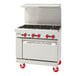 An American Range stainless steel 6-burner range with oven.