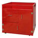 A red metal Paragon popcorn stand with drawers and a door.