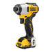 A yellow and black DeWalt XTREME cordless drill with batteries and charger.