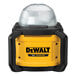 A yellow and black Dewalt work light on a white background.