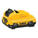 A yellow and black DeWalt 12V MAX lithium-ion battery.