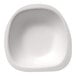A white Jungle Stone compostable sugarcane pulp bowl with a rounded edge.