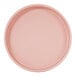 A round blush-colored melamine plate with a raised rim.