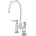 A T&S chrome deck-mount faucet with two lever handles.