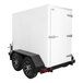 A white box on a white trailer with wheels.