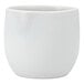 A close up of a white Cloud Terre by Fortessa stoneware cup with a small handle.