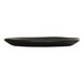 A black round melamine plate with a slightly irregular edge.