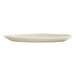 A round ivory melamine plate with a slightly raised edge.