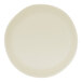 An ivory round melamine plate with a slightly irregular edge.